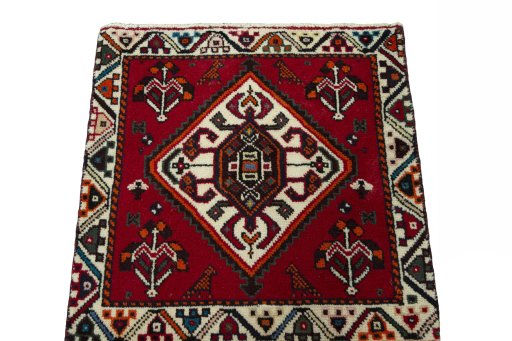 Surface texture of 2000s Shiraz rug with natural Wool and intricate pattern