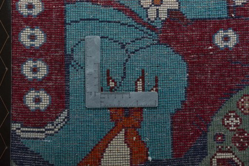 Backside of handmade 2000s Shiraz rug showing knot structure and weave density