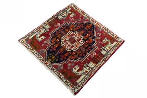 Corner detail of 2000s Shiraz rug showing border pattern and Wool pile