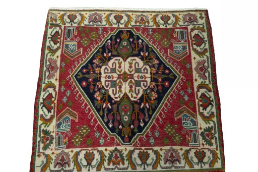 Surface texture of 2000s Shiraz rug with natural Wool and intricate pattern