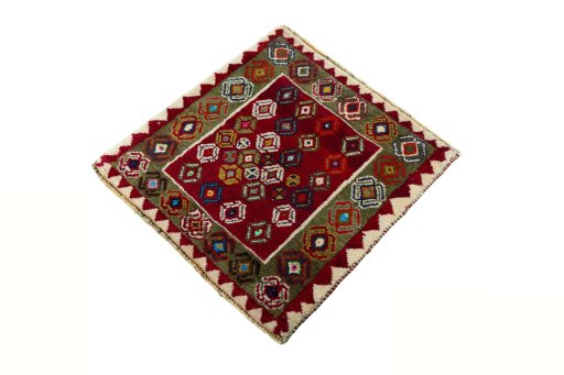 Corner detail of 2000s Shiraz rug showing border pattern and Wool pile