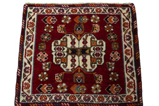 Surface texture of 2000s Shiraz rug with natural Wool and intricate pattern