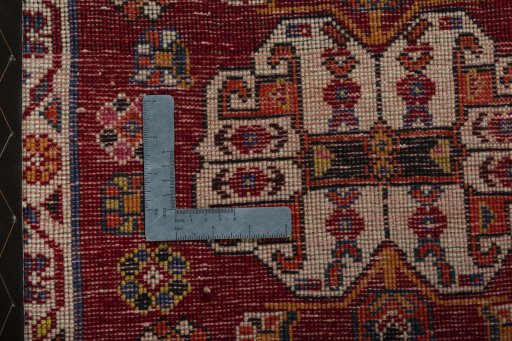Backside of handmade 2000s Shiraz rug showing knot structure and weave density