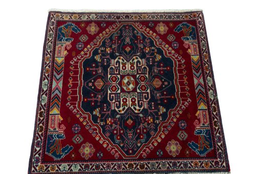 Surface texture of 2000s Shiraz rug with natural Wool and intricate pattern