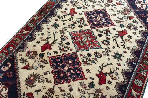 Backside of handmade New Shiraz rug showing knot structure and weave density