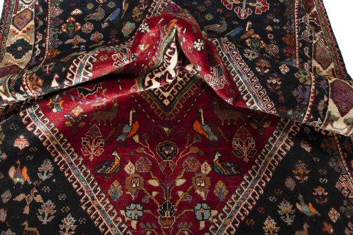 Close-up detail of 2000s Shiraz rug from Iran / Persia showing Wool weave