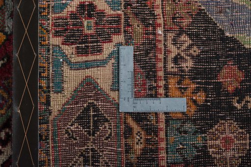 Surface texture of 2000s Shiraz rug with natural Wool and intricate pattern