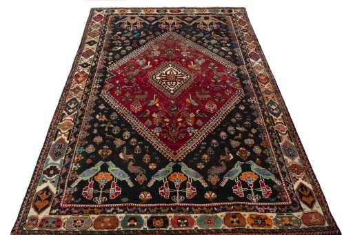 Surface texture of 2000s Shiraz rug with natural Wool and intricate pattern