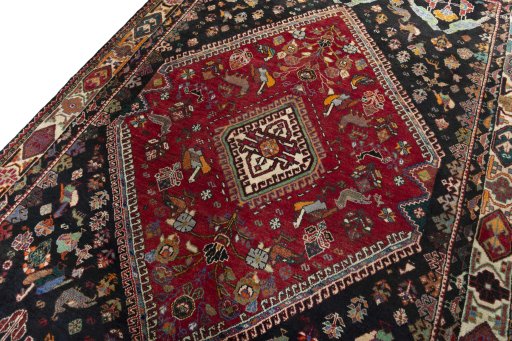Backside of handmade 2000s Shiraz rug showing knot structure and weave density