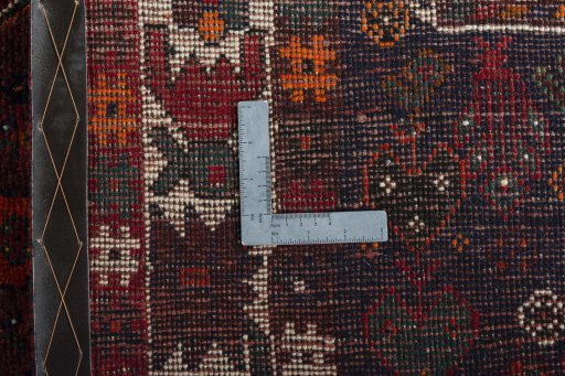 Close-up detail of 2000s Shiraz rug from Iran / Persia showing Wool weave