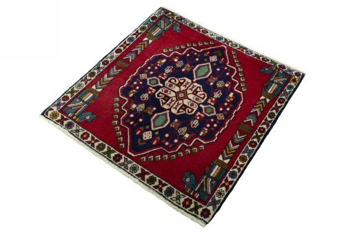 Corner detail of 2000s Shiraz rug showing border pattern and Wool pile