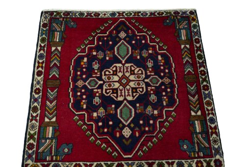 Surface texture of 2000s Shiraz rug with natural Wool and intricate pattern