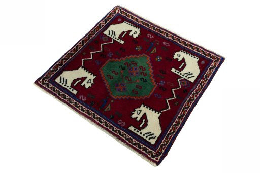 Corner detail of 2000s Shiraz rug showing border pattern and Wool pile