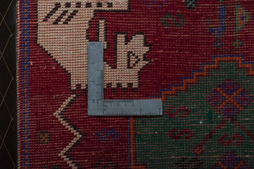 Backside of handmade 2000s Shiraz rug showing knot structure and weave density