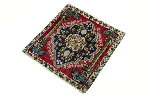 Corner detail of 2000s Shiraz rug showing border pattern and Wool pile
