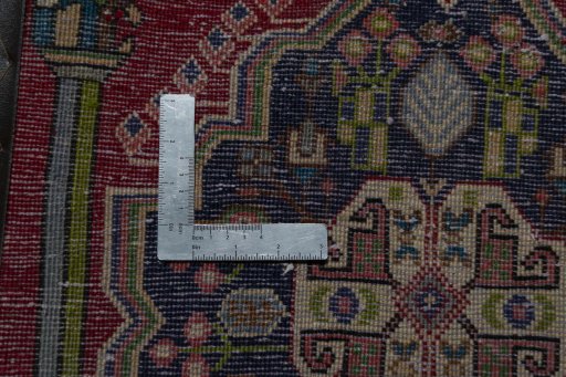 Backside of handmade 2000s Shiraz rug showing knot structure and weave density