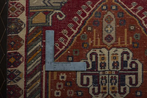 Backside of handmade 2000s Shiraz rug showing knot structure and weave density