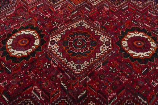 Surface texture of 1970s Shiraz rug with natural Wool and intricate pattern