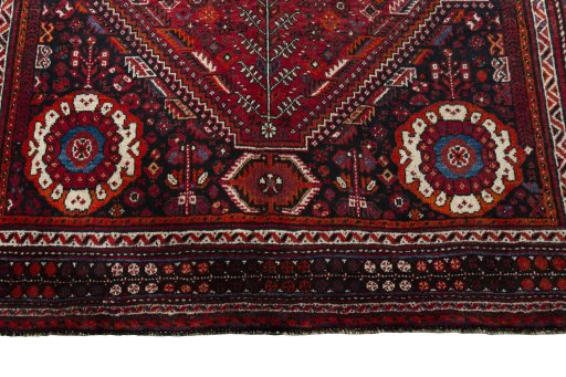 Backside of handmade 1970s Shiraz rug showing knot structure and weave density