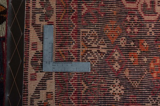 Backside of handmade 2000s Shiraz rug showing knot structure and weave density