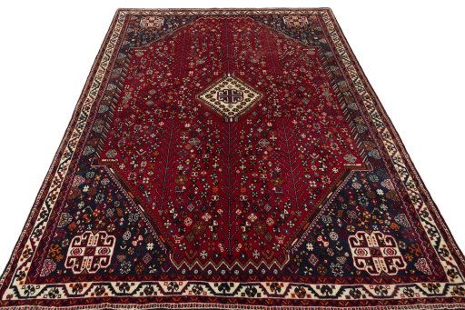 Surface texture of 2000s Shiraz rug with natural Wool and intricate pattern