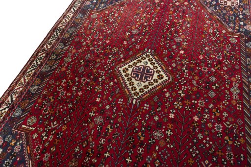 Backside of handmade 2000s Shiraz rug showing knot structure and weave density