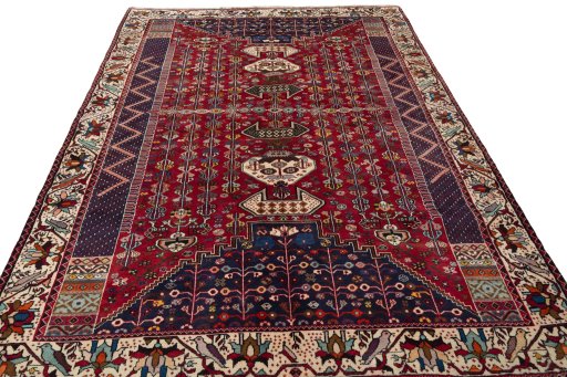 Surface texture of 2000s Shiraz rug with natural Wool and intricate pattern