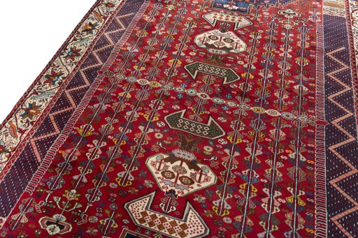 Backside of handmade 2000s Shiraz rug showing knot structure and weave density