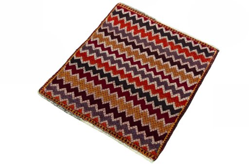 Corner detail of 2000s Shiraz rug showing border pattern and Wool pile