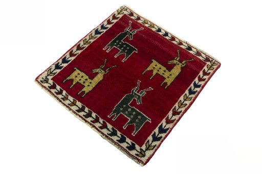 Corner detail of 2000s Shiraz rug showing border pattern and Wool pile