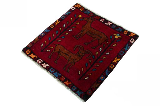 Corner detail of 2000s Shiraz rug showing border pattern and Wool pile