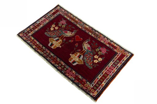 Corner detail of 2000s Shiraz rug showing border pattern and Wool pile