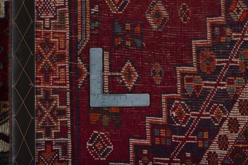 Surface texture of 2000s Shiraz rug with natural Wool and intricate pattern