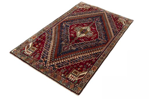 Corner detail of 2000s Shiraz rug showing border pattern and Wool pile