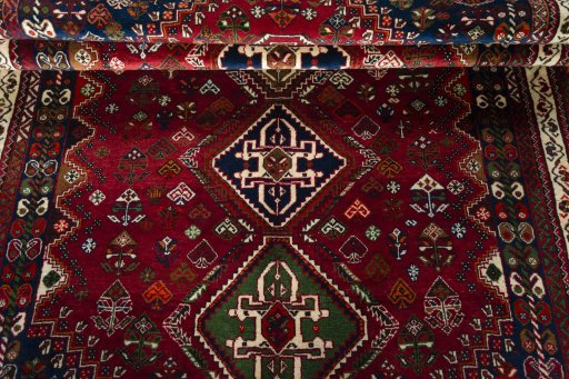 Full view of 2000s Shiraz rug from Iran / Persia, 268 × 168 cm in Red tones