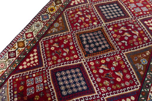 Backside of handmade 2000s Shiraz rug showing knot structure and weave density