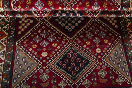 Full view of 2000s Shiraz rug from Iran / Persia, 234 × 135 cm in Red tones