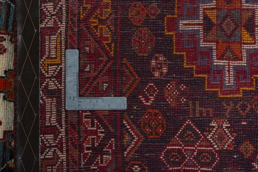 Surface texture of 2000s Shiraz rug with natural Wool and intricate pattern