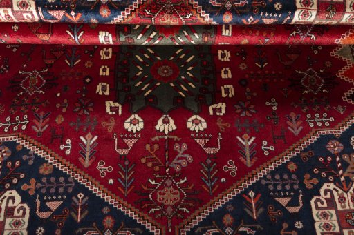 Full view of 2000s Shiraz rug from Iran / Persia, 272 × 176 cm in Red tones