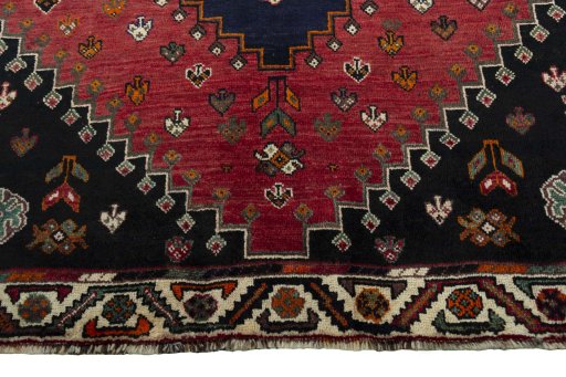 Central medallion detail of 2000s Shiraz rug from Iran / Persia