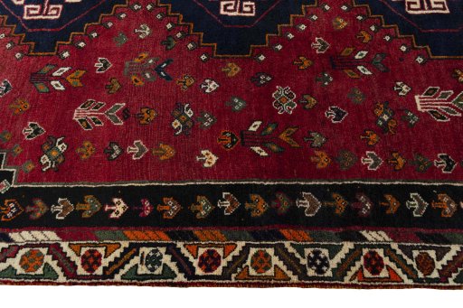 Close-up detail of 2000s Shiraz rug from Iran / Persia showing Wool weave