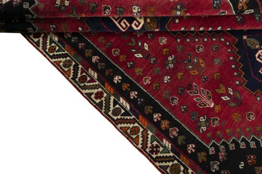 Full view of 2000s Shiraz rug from Iran / Persia, 270 × 178 cm in Red tones