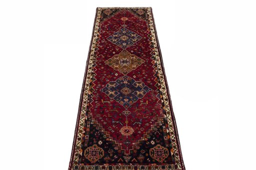 Surface texture of 2000s Shiraz rug with natural Wool and intricate pattern