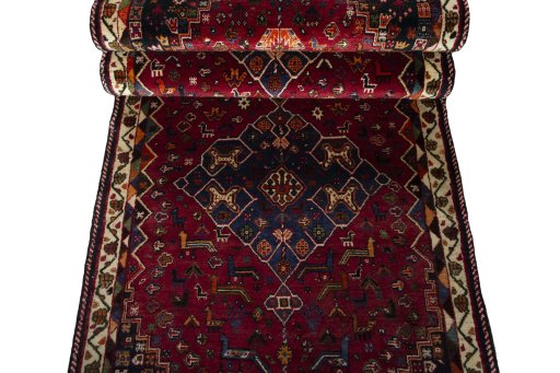 Full view of 2000s Shiraz rug from Iran / Persia, 298 × 100 cm in Red tones