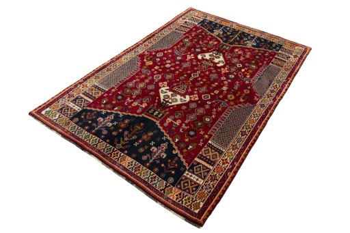 Corner detail of 2000s Shiraz rug showing border pattern and Wool pile