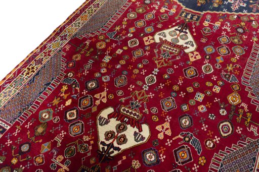 Backside of handmade 2000s Shiraz rug showing knot structure and weave density