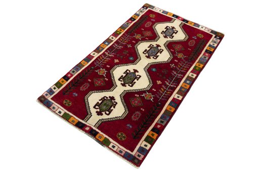 Corner detail of 2000s Shiraz rug showing border pattern and Wool pile