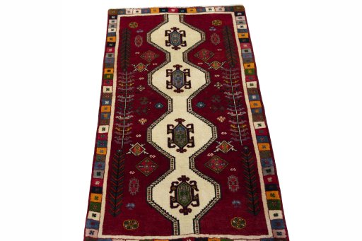 Surface texture of 2000s Shiraz rug with natural Wool and intricate pattern