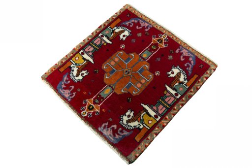 Corner detail of 2000s Shiraz rug showing border pattern and Wool pile