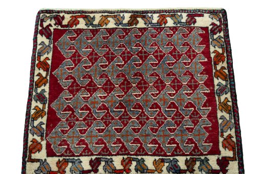 Surface texture of 2000s Shiraz rug with natural Wool and intricate pattern